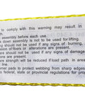 Warning label on yellow Heavy Duty 2 Inch By 27 Foot Ratchet Tie Down With Chain End And Grab Hooks 10000 Lbs Break Strength