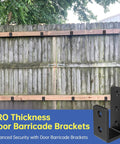 Wooden gate reinforced with Beefy U Shaped Door Barricade Brackets For 2x4 Wood Reinforcement Industrial Grade Steel Security Brackets For Doors Gates Sheds Basements Black 3mm Heavy, showing installation.