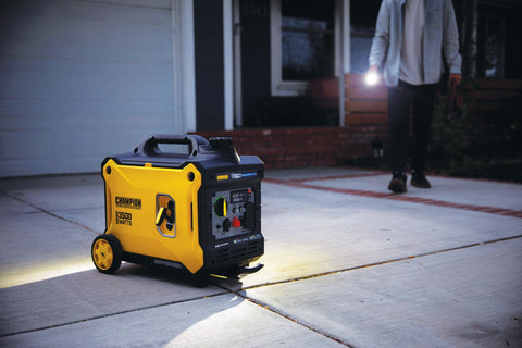 3500 Watt Portable Inverter Generator With Quiet Technology And CO Shield for home use, shown on driveway with wheels visible.