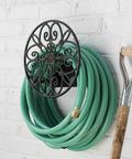 Wall Mounted Garden Hose Holder Holds 125 Feet Of Five Eighth Inch Hose In All Cast Aluminum Construction That Resists Rust