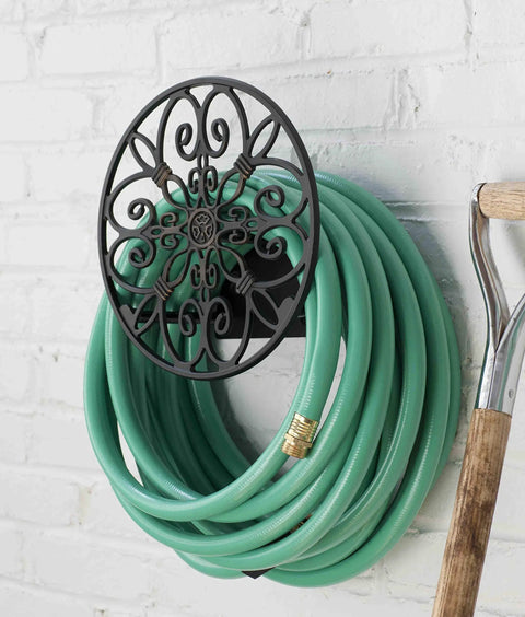 Wall Mounted Garden Hose Holder Holds 125 Feet Of Five Eighth Inch Hose In All Cast Aluminum Construction That Resists Rust