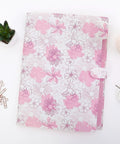 Floral 5 Pocket Accordion File Organizer For Bills Receipts And Documents on desk with glasses and succulent