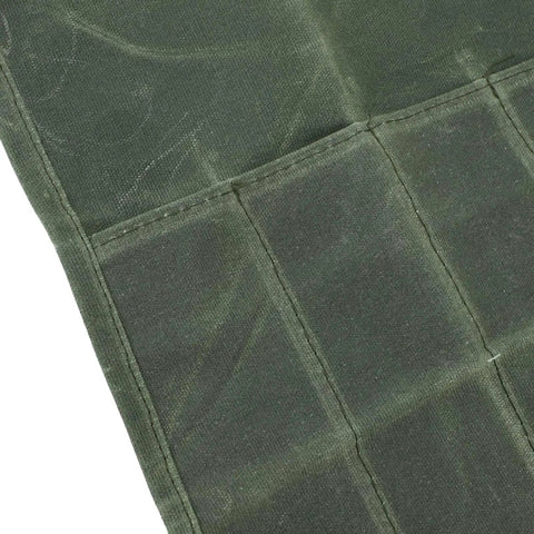 Close-up of padded slots on Outdoor Knife Roll Bag Made From Waxed Canvas With Tough As Nails Padded Slots A Portable Knife Pouch For Chef Knives