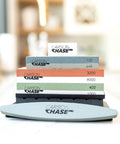 Pro Grade Knife Sharpening Kit With Whetstone Bowl, 15-Piece Set showing stacked dual grit stones with Carson Chase branding