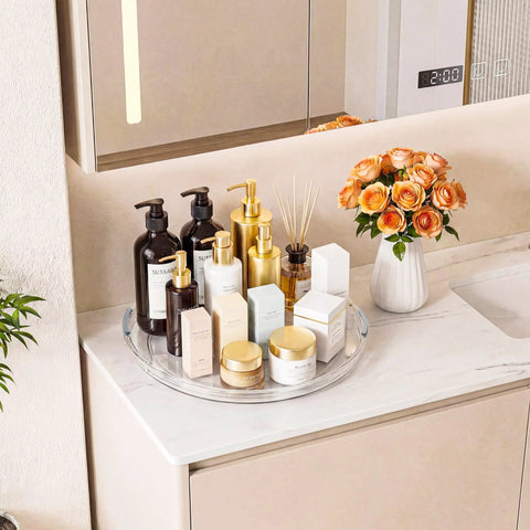 Smooth Operator 12 in Lazy Susan Turntable 4 Pack Crystal Clear BPA Free Plastic Pantry Cabinet Organizer for Spice Rack 360 Spin, showcasing skincare products on a round tray.