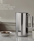 Stainless Steel Electric Kettle With Precision Temperature Control From 104 To 212 F 1200 Milliliters Capacity Double Wall Design Dry Boil Protection Non Drip Spout Heat Safe Handle LED Cool Down Indicator Perfect For Coffee And Tea Lovers on marble countertop