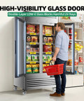 Heavy Duty Commercial Upright Display Freezer With Tempered Glass Door 33.5 Cubic Foot Auto Defrost Digital Temperature Control Rock Solid Stainless Steel Build For Retail And Restaurant Owners showing a shopper viewing frozen goods.