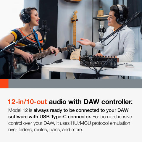 Two musicians using All In One 12-Track Digital Multitrack Studio Mixer With USB Audio Interface And DAW Control.