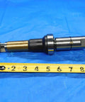 Heavy Duty Adjustable Boring Bar And Precision Deburring Tool For Metal Lathe Operations With Spare Mounting Hardware Pro Top Shelf Workshop Essentials on blue background with measuring tape.