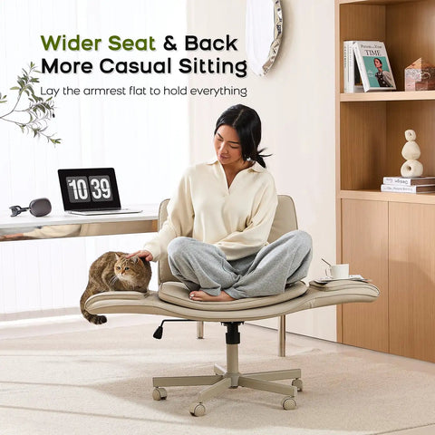 Woman sitting cross-legged on Criss Cross Office Chair With PU Leather Vanity Design, Ergonomic Comfort, 5-Level Adjustable Armrests, Cream.
