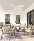 Duval 52 Inch Indoor Outdoor Ceiling Fan With Quick 2 Hang Mount Dual Mount 5 Blade Tropical Design in a patio setting