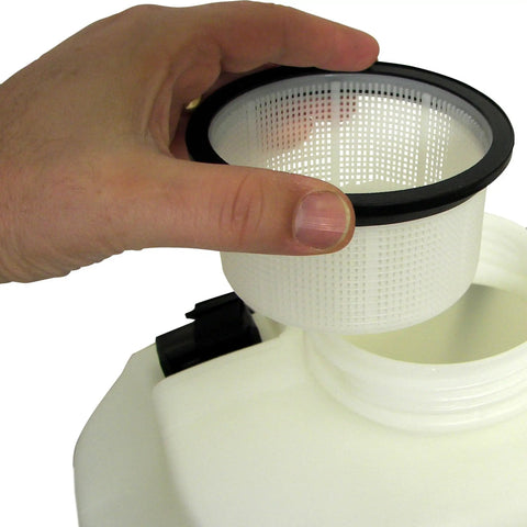 Hand inserting filter into 4 Gallon ProSeries Diaphragm Backpack Sprayer For Fertilizers, Herbicides, And Pesticides with 4 inch mouth