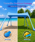 Grab And Go Beach Tent Sun Shelter 10x10 Ft UPF50 Plus Canopy shown on sand and grass with sandbags and grass pegs