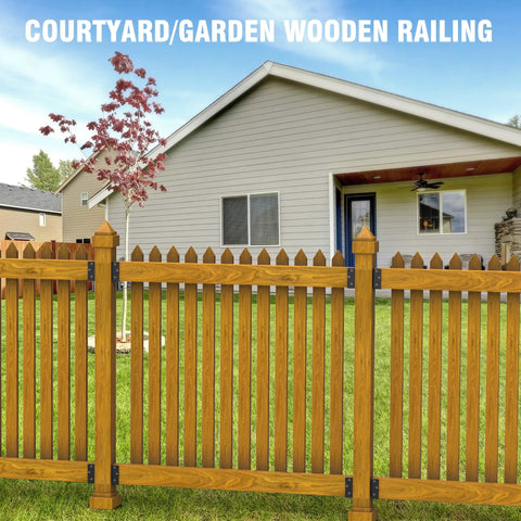 Wooden garden fence with pointed tops outside a house, visible fence panels with beefy heavy duty metal deck railing bracket connector.