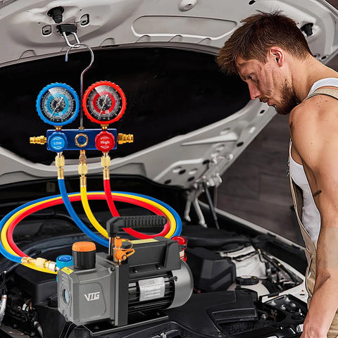 Mechanic using Pro Grade HVAC Vacuum Pump And Gauge Kit With 4.5 CFM Single Stage Pump For Mini Splits And Auto Systems under car hood