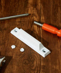 No Fuss 4 Pack Window Sash Lift Handles For Double Hung Frames Heavy Duty Die Cast Zinc Construction Smooth Everyday Grip White Replacement Hardware 3-5/16 Inch Kit Rock Solid on wooden surface with tools.