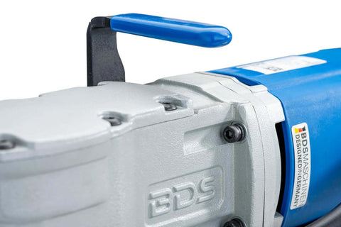 CS Unitec MAB 155PRO ultra-compact magnetic drill with blue handle and gray housing; close-up side view