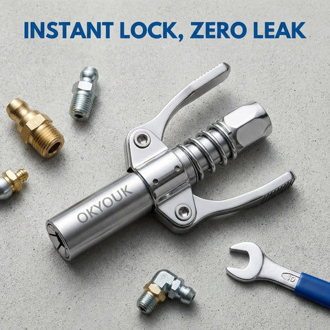High Pressure Grease Gun Coupler For 10,000 PSI Systems, Leak Resistant One Eighth Inch NPT Thread Fitting on concrete with tools