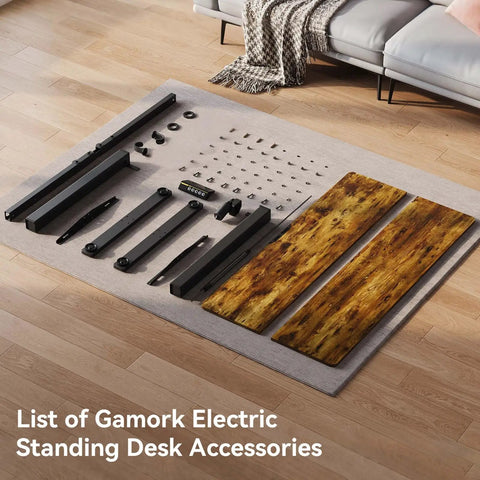 Cool Electric Standing Desk With Smooth Memory Height Presets And Quiet Motor For Big Load Lifts Dual Organizer Hooks Steel Frame accessories laid out on a floor.