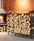 Heavy Duty Firewood Rack For Indoor And Outdoor Use Built Tough Log Holder Stand with firewood stacked by fireplace