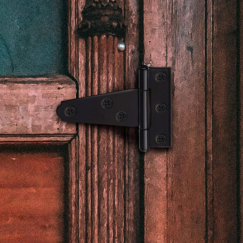 10 Pack 2 Inch Matte Black T Strap Shed Hinges For Barn Doors And Gates Heavy Duty Strap Hinges Set mounted on a wooden door