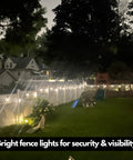 Ambience Pro 48 Ft Solar Outdoor String Lights With 15 Shatterproof 1W LEDs illuminating a backyard fence at night