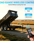 Beefed Up Long Range Wireless Dump Trailer Remote Control Kit For 12V Hydraulic System shown in use with tilt trailer.