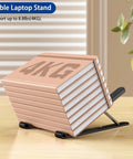 Ergonomic Laptop Stand For 10 To 14 Inch Laptops Portable Riser With 8 Adjustable Angles loaded with books showing durability