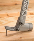 Aluminum Framing Hammer 14 oz with Milled Face, Straight Rip Claw, Shock Reduction Grip, side view on wooden surface