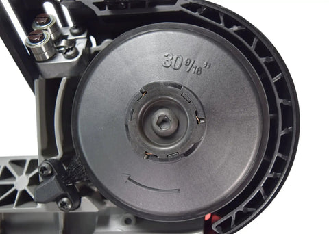 Close-up view of M12 FUEL 12 Volt Cordless Compact Band Saw Kit wheel mechanism with 4.0 Ah Battery, showcasing the cutting wheel.