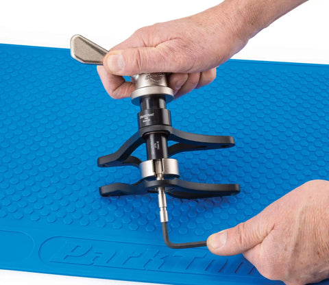 Pro Grade Suspension Bearing Kit With 27 Precision Machined Guides In A Handy Storage Case Easily Remove And Reinstall Bearings For Tight Square Linkage Alignment Silver on blue mat