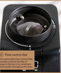 Pro Tier Stepless Grind Adjustment Coffee Grinder Featuring Precision Steel Burrs And Quick Release Design For Smooth Shot Pulling Or Effortless Daily Brewing In Slick Black Finish flow control disk detail with transparent lid.