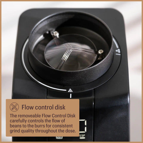 Pro Tier Stepless Grind Adjustment Coffee Grinder Featuring Precision Steel Burrs And Quick Release Design For Smooth Shot Pulling Or Effortless Daily Brewing In Slick Black Finish flow control disk detail with transparent lid.