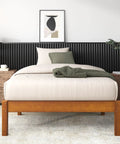 Heavy Duty 14 Inch Bamboo Platform Bed Frame Twin Size With No Box Spring Needed showcasing a minimalist design with bamboo legs.