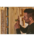 Laser Pocket Measure 12 m Handheld Distance Tool For Pros, Contractors, And DIYers, Compact And Durable Laser Measurer With Quick Readouts, Accurate Measurements, Ideal For Carpentry, Interior Design, And Renovations Model STHT77666-0 in use on wood framing