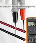 Ultra Sharp Gold Plated Test Probe Lead Set For Multimeters 1000V 20A inserted into wires with digital multimeter display