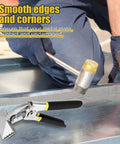 Using Pro Grade 3 Inch Curved Jaw Offset Hand Seamer for sheet metal bending and flattening with a rubber mallet on metal surface.