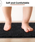 Child's feet on Non Slip Stair Treads For Wood Steps Peel And Stick 8x30 Inch Runner Rug Black 15 Pack Kid Friendly Pet Safe