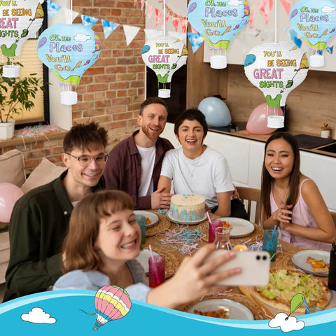 Oh The Places You’ll Go themed 12 inch hot air balloon paper lanterns 8 pack totally dope graduation party decor hanging above dining table