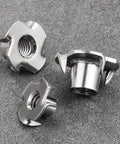 Three 1/4-20 four-jaw T-nuts, 304 stainless steel, for threaded insertion.