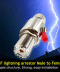 UHF PL259 Male To Female Lightning Arrester And SO239 Coaxial Surge Protector with gas tube, metal finish, against lightning background