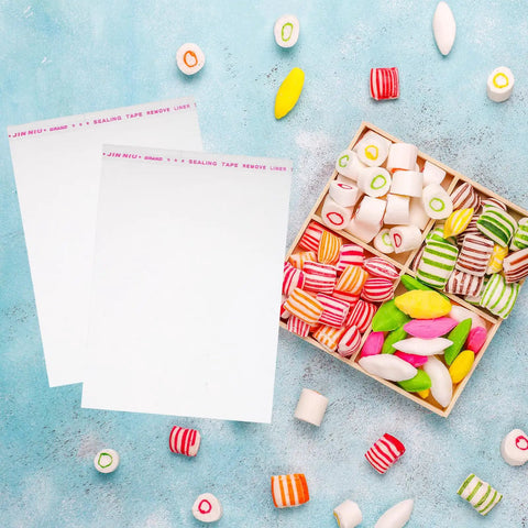 100 Pcs Resealable OPP Cellophane Bags For Cookies And Snacks with colorful candies, self sealing packaging, clear storage