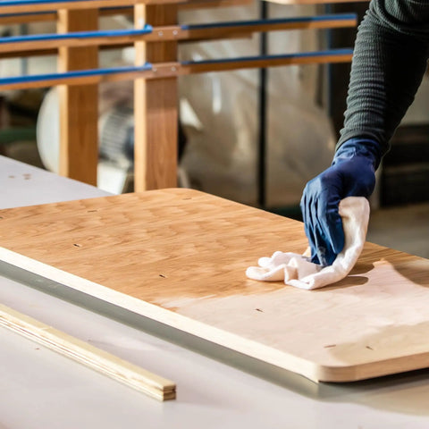 Person using Raw Wood Cleaner For Prep And Finish Electrostatic Dust Removal After Sanding And Vacuuming Cleans Wood Surfaces Before Oil