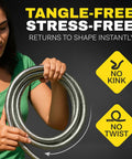 Bionic Steel 10 ft steel hose extension coil held by a person in a green shirt, front view.