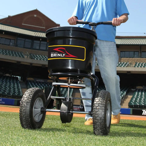 Heavy-Duty Push Spreader With Side Deflector Kit And Hopper Grate For Lawn Care, 50 lb capacity on grass, black finish