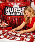 Epic Nursing Graduation Party Supplies Kit 102 Pcs Includes Blood Bag Drink Pouches set up at RN BSN celebration