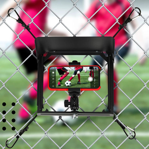 Fence Mount For Cell Phone With Shade And Power Bank Pouch Outdoor Phone Holder Kit That Reduces Glare Keeps Screen Visible And Cool No Fuss Easy Install For Deck Or Fence Rail Game Changer Mounting Kit on chain-link fence with phone recording soccer