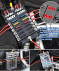 Rugged 12 Way 12V Fuse Box With LED Indicator Waterproof Cover And Ground Bus, installed in vehicle engine compartment.