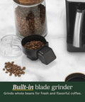 All In One Grind And Brew Coffee Center With Built In Grinder Coffeemaker displaying grinder lid and coffee beans