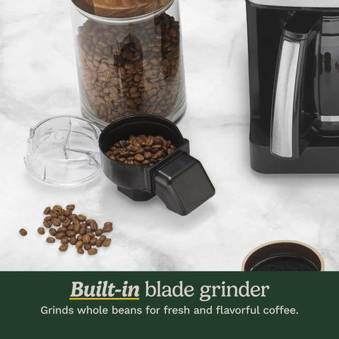 All In One Grind And Brew Coffee Center With Built In Grinder Coffeemaker displaying grinder lid and coffee beans